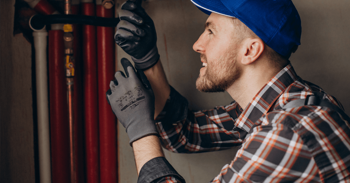 Technician repairing fridge