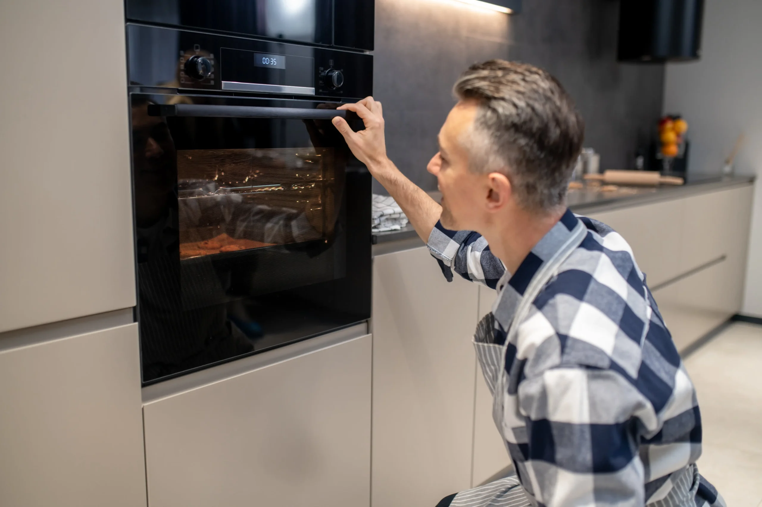 Technician repairing fridge